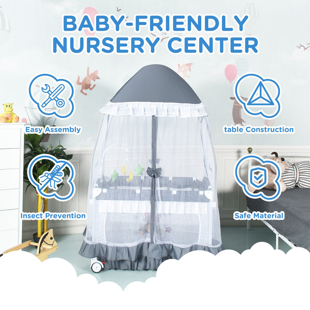 4-in-1 Baby Playard Crib with Bassinet Bed Table Canopy and Music Box